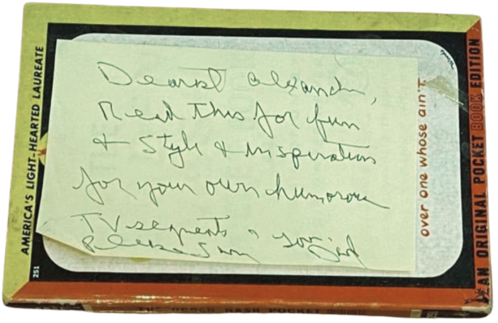 A Post-it note from Alexandra's father on a book